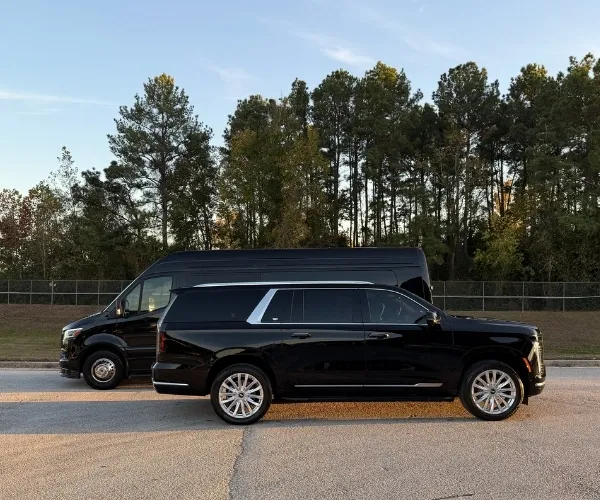 A luxury transportation fleet featuring a black Cadillac Escalade SUV and an executive Mercedes Sprinter van. The image showcases the different vehicle sizes available for private chauffeur services, from individual executive travel to group transport.