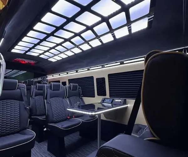 Luxury Mercedes-Benz Sprinter van interior with premium seats and ambient lighting