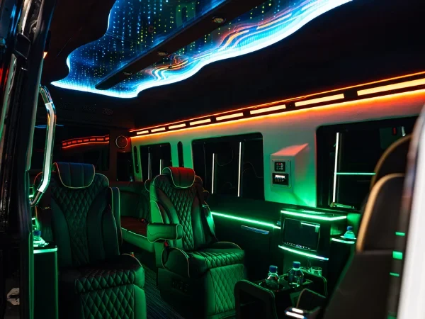 Luxury party bus interior with colorful LED lighting